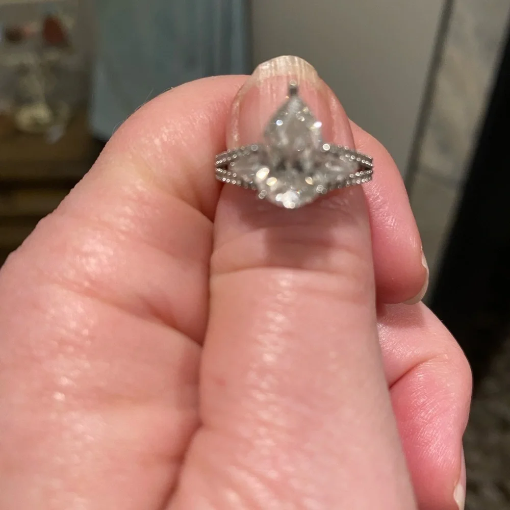 14 karat white gold lab diamond ring.